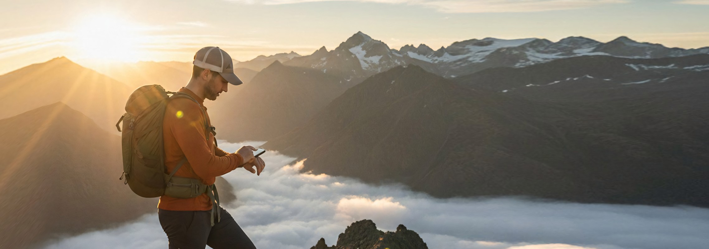 Hiker with backpack on a mountain trail — Trekstasy trip planning app